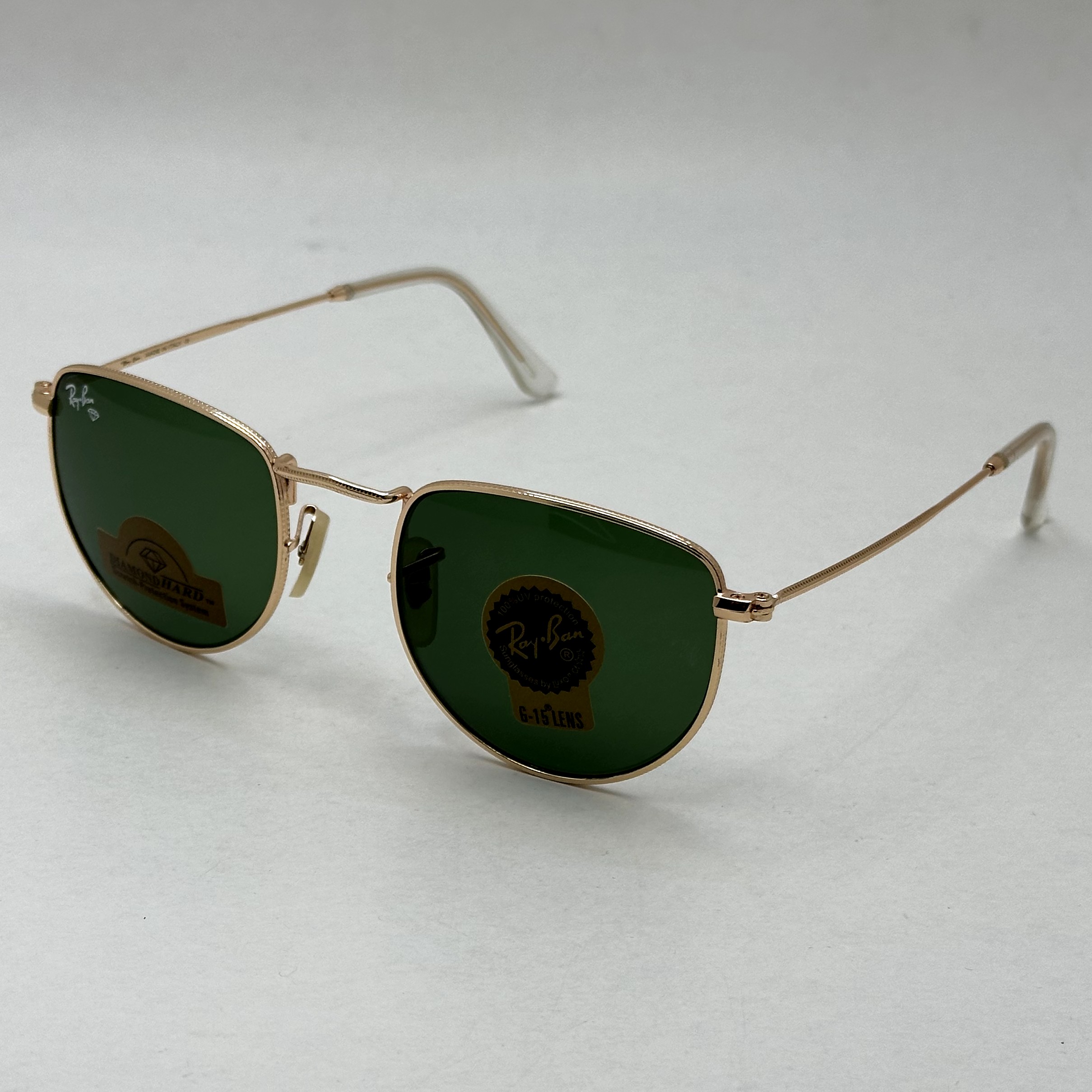 عینک آفتابی ریبن rayban شیشه سنگ سبز طلایی کد rb 3958 - فول پک