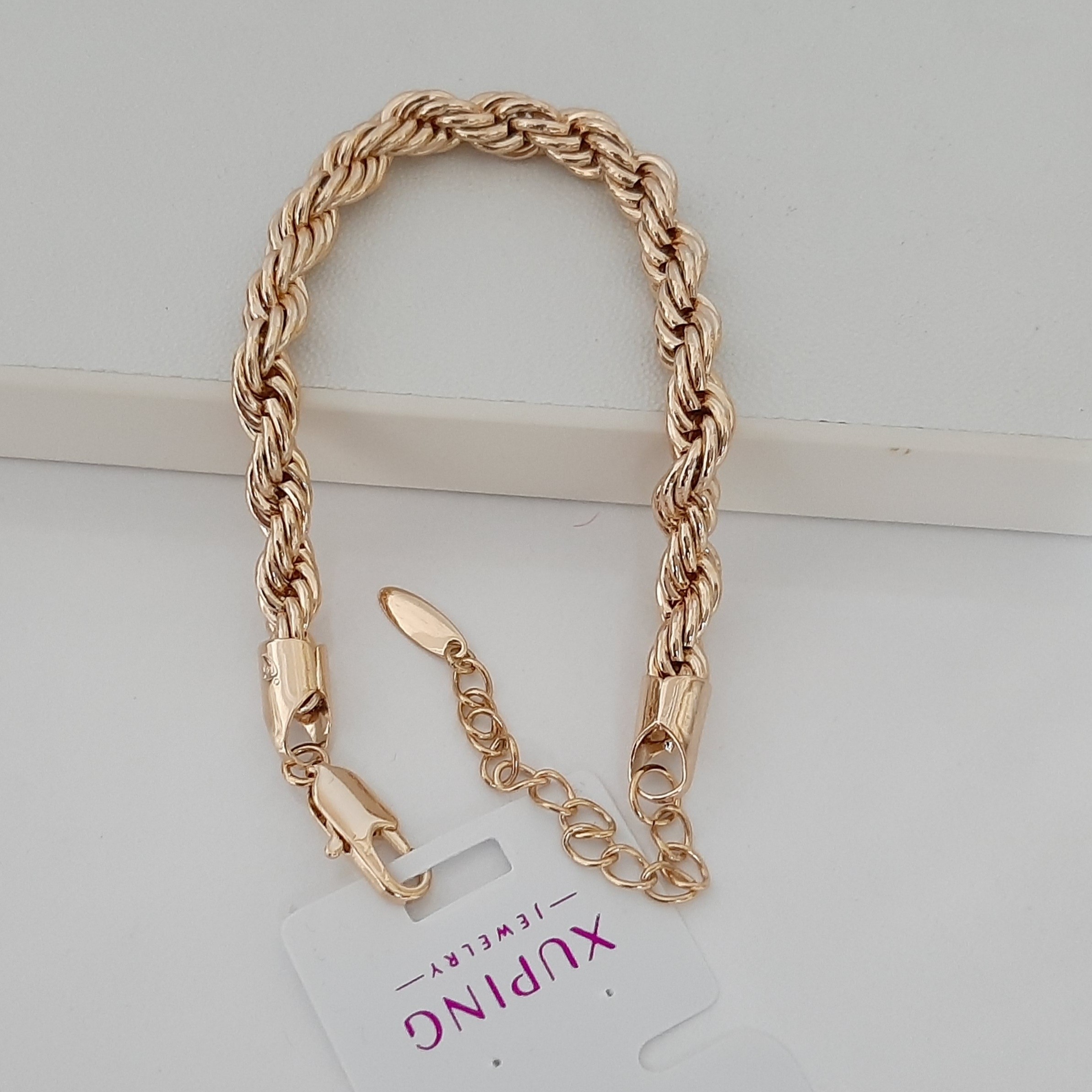 دستبند طنابی ژوپینگ کاملا رنگ ثابت حک خورده و آبکاری طلا شده ورق بزنید لطفا